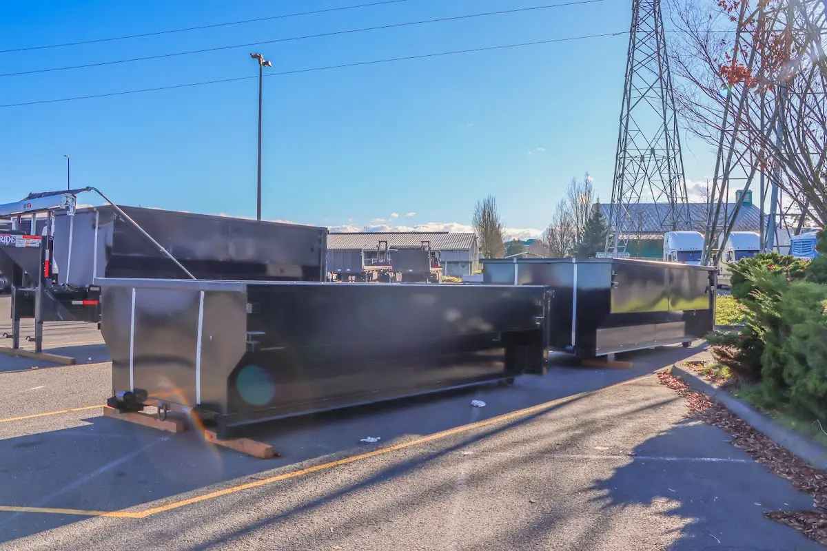 Roll-off dumpster ready for waste disposal at job site for Roofing Dumpster Rental in Lee